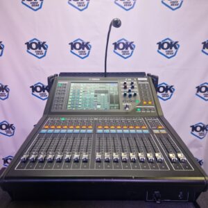 – Yamaha QL1 digital mixing desk, renowned for its exceptional audio quality, well-suited for both live events and studio use. – Rated as “Used 5 – Great” condition, ensuring reliable performance for professional applications. – Includes a sturdy flight case, dust cover, and a small light for added convenience. – Features multiple inputs and outputs, making it versatile for concerts, corporate events, theatres, and more. – Comes with a standard 21-day seller warranty for peace of mind.