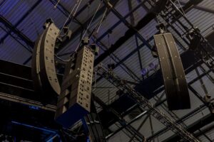 Professional line array speaker system installed at a live event venue | 10k uSED gEAR