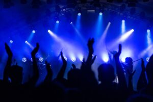 Professional line array speaker system providing clear concert sound at a live music event.